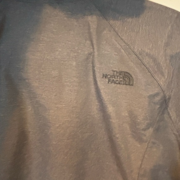 The North Face Charcoal Gray Rain Parka with gold zipper. - Picture 8 of 8